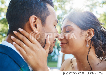 Love, couple and nose kiss for wedding connection, partner support and outdoor for romantic moment. Smile, commitment and people with marriage celebration in park, care and trust for special day Love, couple and nose kiss for wedding connection, partner support and outdoor for romantic moment. Smile, commitment and people with marriage celebration in park, care and trust for special day 139779752
