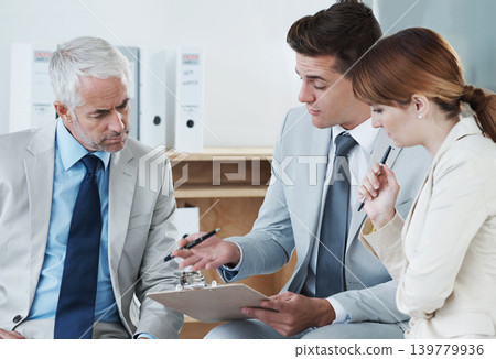 Business people, talking or lawyer with contract for paperwork, strategy or notes at office. Financial advisor, teamwork or employees with documents, deal or legal advice in meeting for consultation 139779936