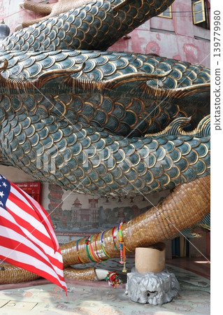Dragon Statue with American Flag and Decorative Elements Dragon Statue with American Flag and Decorative Elements 139779980