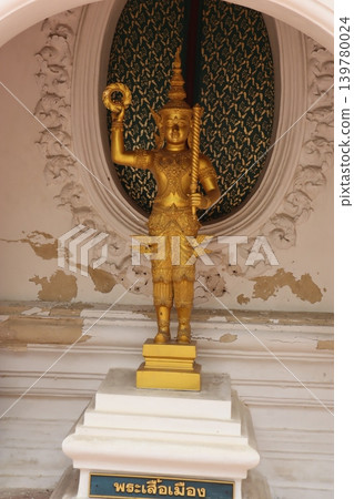 Golden Thai Statue in Ornate Building Interior Golden Thai Statue in Ornate Building Interior 139780024