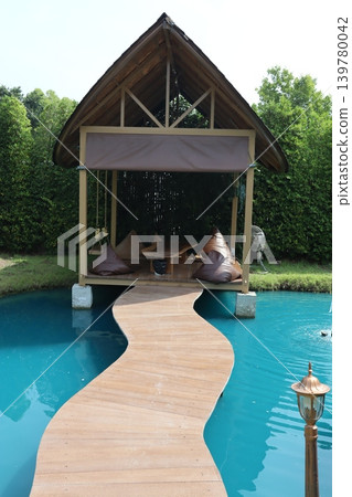 Poolside Gazebo with Curved Deck and Greenery Poolside Gazebo with Curved Deck and Greenery 139780042