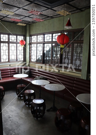Traditional Chinese Interior with Lattice Windows and Lanterns Traditional Chinese Interior with Lattice Windows and Lanterns 139780051