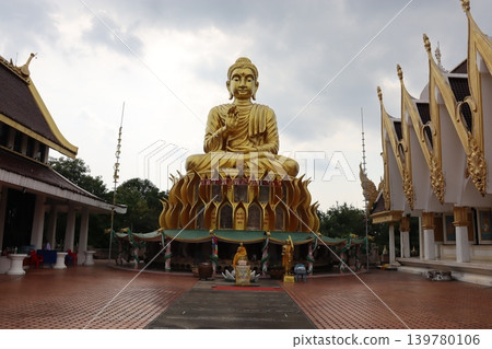 Golden Buddha Statue in Thai Temple Complex Golden Buddha Statue in Thai Temple Complex 139780106