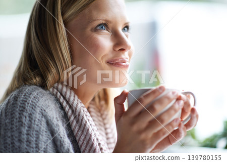 Coffee shop, happy and face of woman with drink, caffeine beverage and cappuccino for aroma. Customer, relax and person with mug in restaurant, cafe and diner for breakfast, satisfaction and wellness 139780155