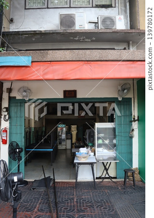 Shop Entrance with Fans and Outdoor Setup Shop Entrance with Fans and Outdoor Setup 139780172