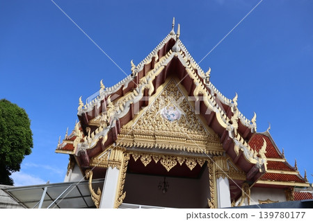 Thai Temple Gable with Golden Decor Thai Temple Gable with Golden Decor 139780177