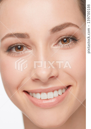 Skincare, closeup and happy woman with beauty from dermatology or headshot for cosmetics. Girl, smile and portrait with perfect teeth and skin from healthy care and treatment with model in studio Skincare, closeup and happy woman with beauty from dermatology or headshot for cosmetics. Girl, smile and portrait with perfect teeth and skin from healthy care and treatment with model in studio 139780186