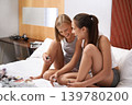 Woman, friends and bonding with manicure, nail polish and beauty for girls night out and laughter. Sisters, sleepover and smile to relax, catch up and happiness together or roommate and gossip 139780200