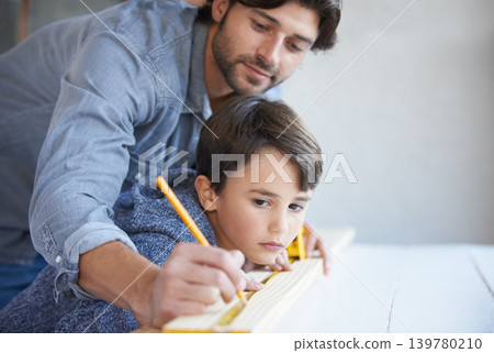 Father, son and woodwork or teaching for furniture manufacturing for bonding, home repairs or construction. Male person, child and parenting for carpenter learning or renovation, lesson or building Father, son and woodwork or teaching for furniture manufacturing for bonding, home repairs or construction. Male person, child and parenting for carpenter learning or renovation, lesson or building 139780210