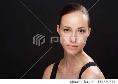 Studio, serious or beauty of woman in portrait, cosmetic or facial treatment on black background. Model, pride or make up in spa cosmetology for mockup space, retinol or collagen for skincare results Studio, serious or beauty of woman in portrait, cosmetic or facial treatment on black background. Model, pride or make up in spa cosmetology for mockup space, retinol or collagen for skincare results 139780211
