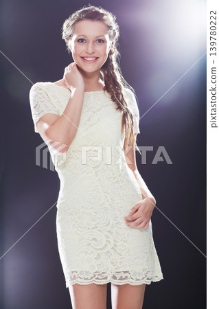 Woman, studio and portrait with fashion, lace and dress for beauty, face and smile. Model, happy and proud with light, motivation and attitude with empowerment, confidence and isolated glamour Woman, studio and portrait with fashion, lace and dress for beauty, face and smile. Model, happy and proud with light, motivation and attitude with empowerment, confidence and isolated glamour 139780222