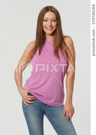 Woman, fashion and style confidence in studio for cool trend with jeans for relax, clothes or white background. Female person, model and smile with mockup space for natural beauty, casual or Canada 139780268