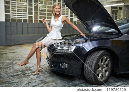 Woman, fashion and portrait on car engine for repair with spanner for maintenance for breakdown, mechanical or oil leak. Female person, face and vehicle bonnet or tools in parking garage, auto or fix Woman, fashion and portrait on car engine for repair with spanner for maintenance for breakdown, mechanical or oil leak. Female person, face and vehicle bonnet or tools in parking garage, auto or fix 139780319