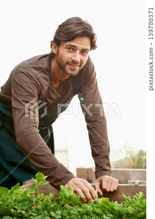Portrait, gardener and smile with vegetables in box for cultivation, harvest or growth in greenhouse. Man, happy and agriculture in nursery for development, gather or picking of organic produce Portrait, gardener and smile with vegetables in box for cultivation, harvest or growth in greenhouse. Man, happy and agriculture in nursery for development, gather or picking of organic produce 139780371