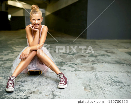 Ballerina woman, outside, and sneakers for practice, recital and crossed legs for portrait smile. Caucasian female, pink dress and shoes for mockup, space and underground parking background Ballerina woman, outside, and sneakers for practice, recital and crossed legs for portrait smile. Caucasian female, pink dress and shoes for mockup, space and underground parking background 139780533