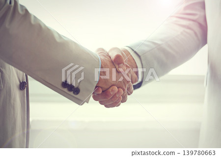 Handshake, business people and agreement in partnership, networking and thank you for recruitment. Coworkers, closeup and welcome or introduction in office, collaboration and support in cooperation Handshake, business people and agreement in partnership, networking and thank you for recruitment. Coworkers, closeup and welcome or introduction in office, collaboration and support in cooperation 139780663