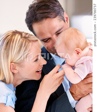 Couple, love and closeup with home, baby and smile for happy, child and mother. Parents, daughter and kitchen with house kids and father for bonding, family and children with touch and holding Couple, love and closeup with home, baby and smile for happy, child and mother. Parents, daughter and kitchen with house kids and father for bonding, family and children with touch and holding 139780737