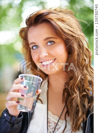 Portrait, smile and woman with drink at music festival, bokeh or celebration outdoor. Face, happy or girl with beverage at party, alcohol and beauty of young female person on summer holiday in France Portrait, smile and woman with drink at music festival, bokeh or celebration outdoor. Face, happy or girl with beverage at party, alcohol and beauty of young female person on summer holiday in France 139780740