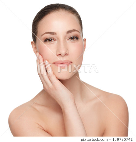 Woman, portrait and facial, natural beauty and cosmetics with dermatology isolated on white background. Hand, skincare and self care with clean face and wellness, model with glow in a studio Woman, portrait and facial, natural beauty and cosmetics with dermatology isolated on white background. Hand, skincare and self care with clean face and wellness, model with glow in a studio 139780741