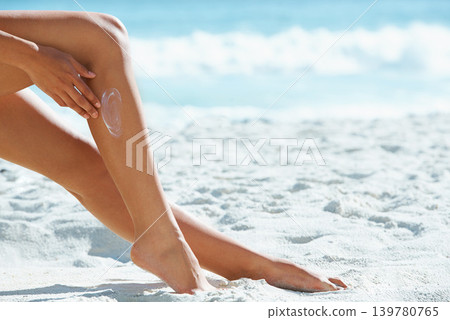 Sunscreen, legs and woman on beach with space, sand and skincare for summer holiday in Bali. Cream, lotion and sun protection for girl on ocean vacation with mockup, travel and spf on tropical island Sunscreen, legs and woman on beach with space, sand and skincare for summer holiday in Bali. Cream, lotion and sun protection for girl on ocean vacation with mockup, travel and spf on tropical island 139780765