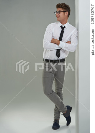 Business man, eyewear and confidence in studio, formal fashion and consultant on gray background. Male person, full body and entrepreneur on backdrop, smiling and pride for career on mockup space Business man, eyewear and confidence in studio, formal fashion and consultant on gray background. Male person, full body and entrepreneur on backdrop, smiling and pride for career on mockup space 139780767