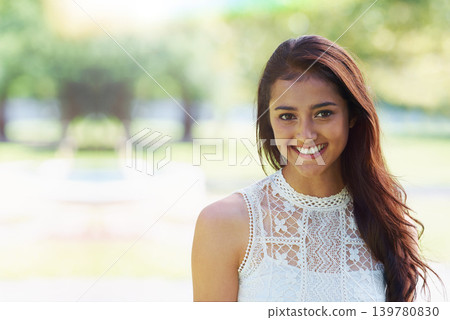 Woman, portrait and happy relaxing in park or garden, smiling and joyful on summer holiday. Female person, peace and enjoy vacation in countryside, outdoors and calm on weekend adventure in nature Woman, portrait and happy relaxing in park or garden, smiling and joyful on summer holiday. Female person, peace and enjoy vacation in countryside, outdoors and calm on weekend adventure in nature 139780830
