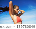Beach, thinking and woman with vacation, summer and break with tropical island and getaway trip. Person, outdoor and sky background with girl and sunshine with fresh air and adventure with journey 139780849