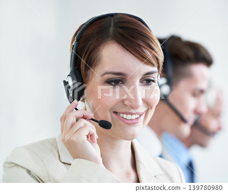 Woman, callcenter and phone call, CRM or contact us with headset and mic, coworking and smile for communication. Telecom, customer service or telemarketing with agent for tech support or help desk Woman, callcenter and phone call, CRM or contact us with headset and mic, coworking and smile for communication. Telecom, customer service or telemarketing with agent for tech support or help desk 139780980