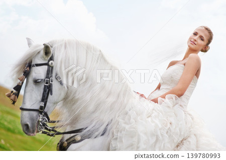 Wedding, woman and riding with horse or portrait outdoor with happiness for celebration, marriage and confidence. Bride, person and stallion on lawn in field with smile, dress and animal at ceremony Wedding, woman and riding with horse or portrait outdoor with happiness for celebration, marriage and confidence. Bride, person and stallion on lawn in field with smile, dress and animal at ceremony 139780993