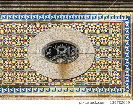 Traditional Portuguese azulejo tiled wall with window Traditional Portuguese azulejo tiled wall with window 139782699