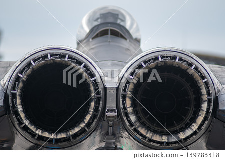 Cherry Point, North Carolina - May 9 2026: Twin jet exhaust nozzles on military aircraft display Cherry Point, North Carolina - May 9 2026: Twin jet exhaust nozzles on military aircraft display 139783318