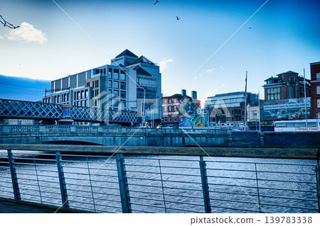 Ha Penny Bridge over River Liffey in Dublin Ireland at Sunrise with Historic Pedestrian Bridge Ha Penny Bridge over River Liffey in Dublin Ireland at Sunrise with Historic Pedestrian Bridge 139783338