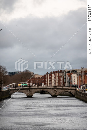 Dublin Ireland Cityscape Along River Liffey with Historic Bridges Waterfront Buildings Dublin Ireland Cityscape Along River Liffey with Historic Bridges Waterfront Buildings 139783355