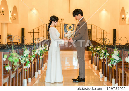 Wedding hall, bride and groom in the chapel (aisin road, church, chapel) Wedding hall, bride and groom in the chapel (aisin road, church, chapel) 139784021