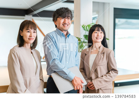 Boss in a company office, male executive businessman and assistant, female secretary staff Boss in a company office, male executive businessman and assistant, female secretary staff 139784583
