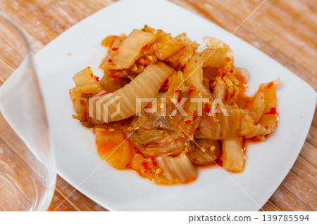 Traditional Korean dish, kimchi, served on table Traditional Korean dish, kimchi, served on table 139785594