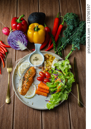 Grilled salmon fish fillet and fresh vegetable salad. Healthy food. Top view 139786397