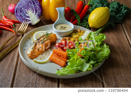 Grilled salmon fish fillet and fresh vegetable salad. Healthy food. Top view 139786404