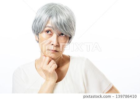Thinking elderly women Thinking elderly women 139786410