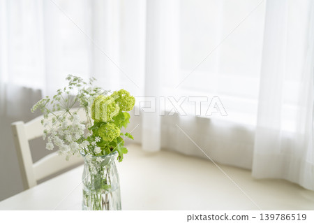 Flowers placed on the dining table Flowers placed on the dining table 139786519