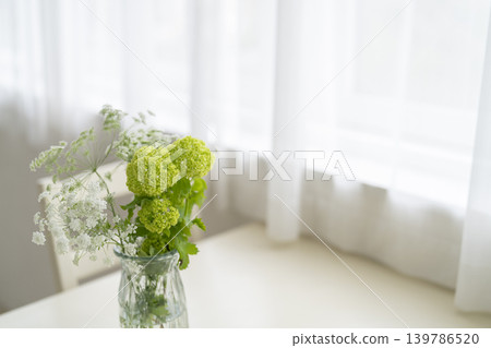 Flowers placed on the dining table Flowers placed on the dining table 139786520