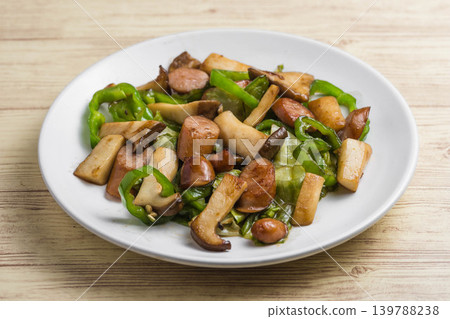 Stir-fried king oyster mushrooms and sausages Stir-fried king oyster mushrooms and sausages 139788238