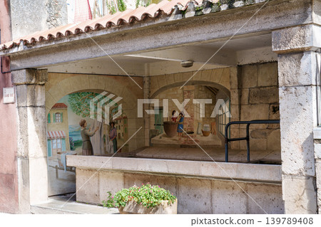 Aiguines, France - Sep 22, 2025: Picturesque old houses in the city of Aiguines in France nearby Lac de Sainte Croix. 139789408