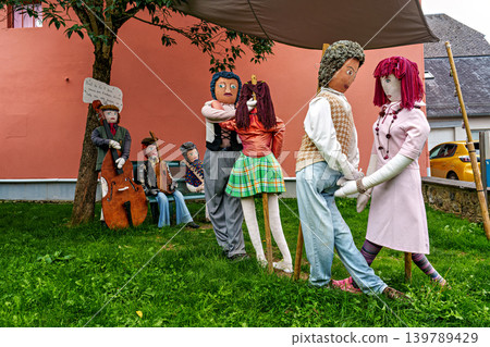 The Mounaques are life size dolls dressed in clothing in Campan, 139789429