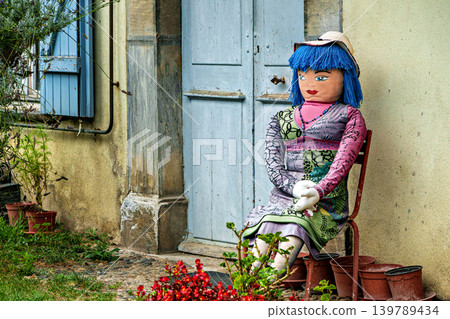 The Mounaques are life size dolls dressed in clothing in Campan, 139789434