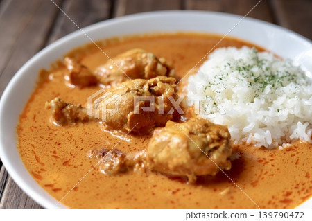 Butter chicken curry made with drumstick chicken Butter chicken curry made with drumstick chicken 139790472