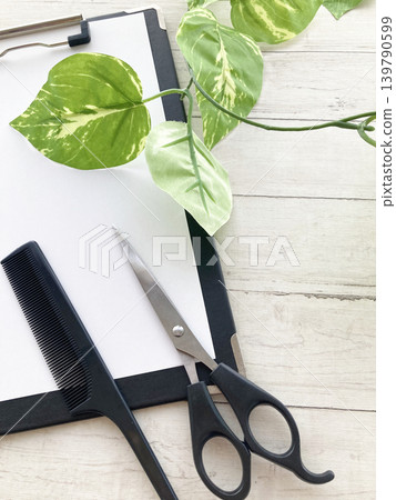 Hair salon consultations, menus, binders, and hair cutting scissors and combs. Hair salon consultations, menus, binders, and hair cutting scissors and combs. 139790599
