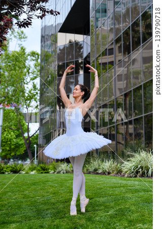 Ballerina standing en pointe on lawn in San Jose 139790718