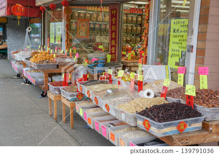 An Asian market featuring traditional Chinese medicine and dried goods. An Asian market featuring traditional Chinese medicine and dried goods. 139791036