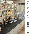 A university chemistry lab lined with experimental equipment. 139791051